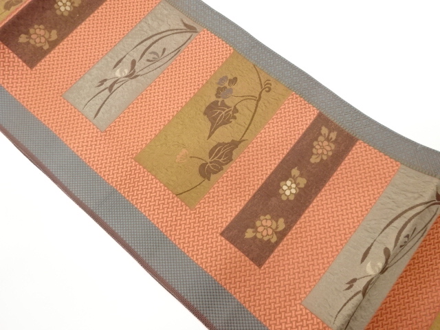 Honjo Chikuzen Hakata Nagoya obi, woven with a floral-leaf pattern on tanzaku